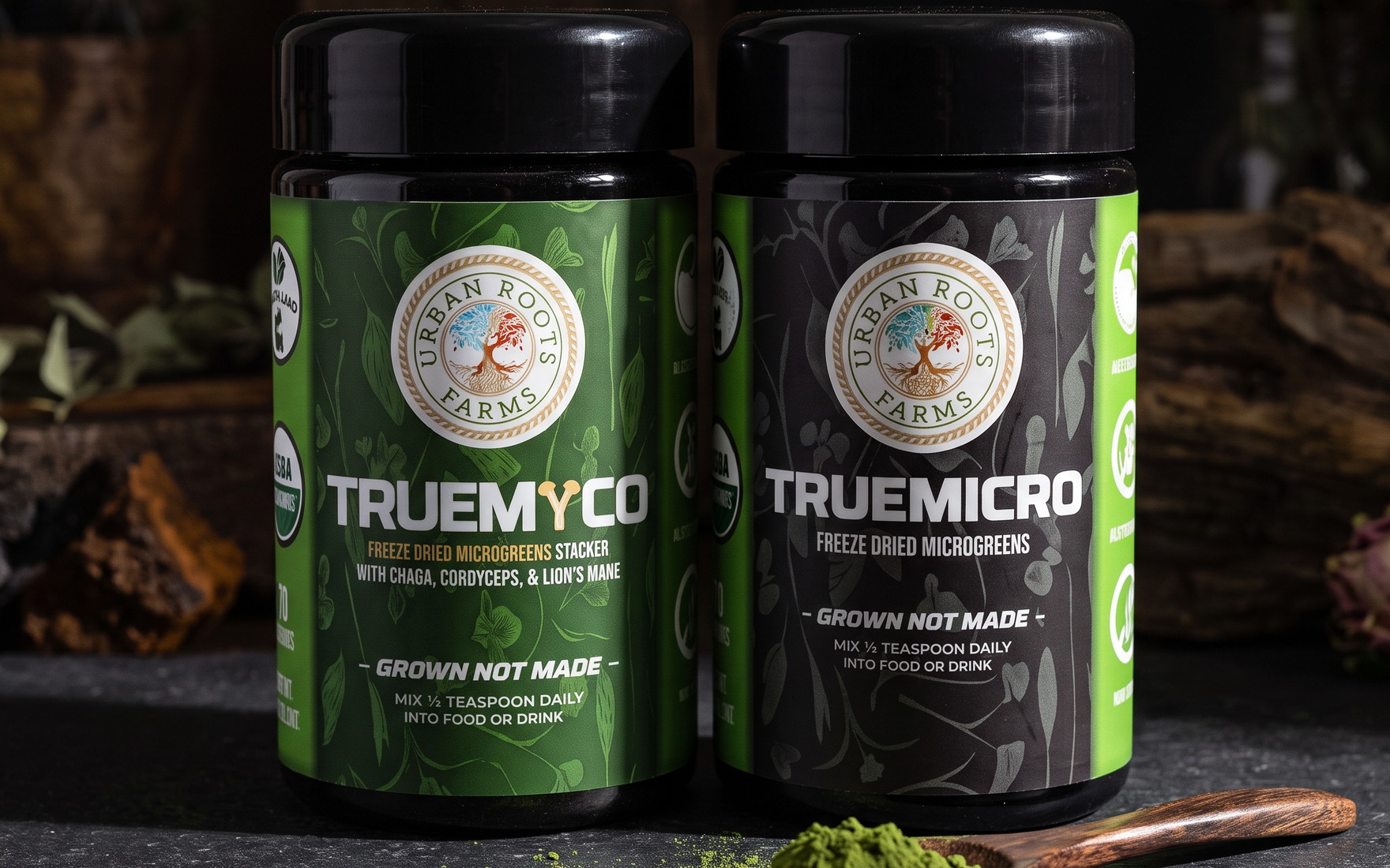 TrueMicro and TrueMyco jars together on slate with a spoon of green powder